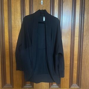This is a Spanx Airluxe Air Essentials Cocoon Cardigan in black